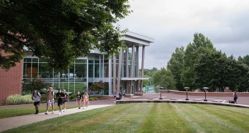 Exterior view of the Waldner Performing Arts Center and the campus lawn.