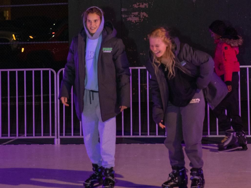 2 Students are ice skating at York College's Winterfest