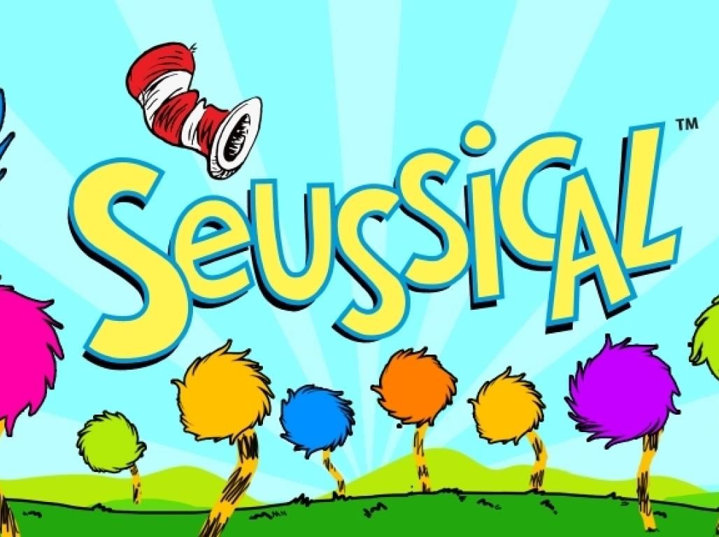 The Seussical poster, a multicolored line of fanciful furry trees, under the word Seussical, topped by the red and white Cat-in-the-Hat's hat. 