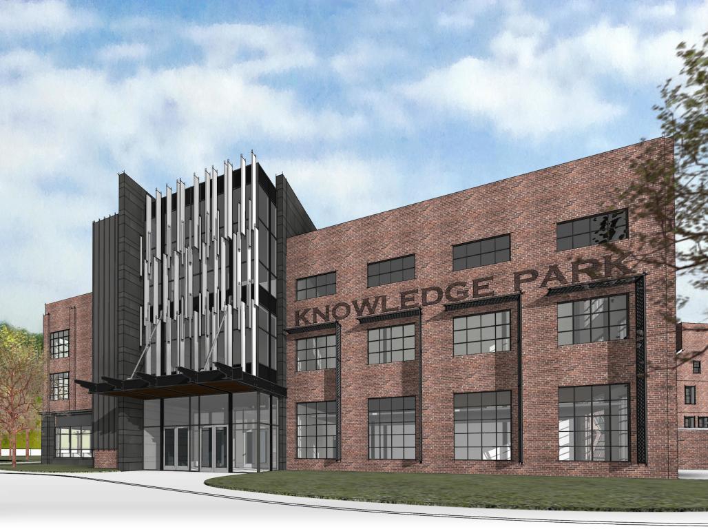An artist's rendering illustrates a renovated brick building with letters spelling "Knowledge Park" across the front of the exterior.