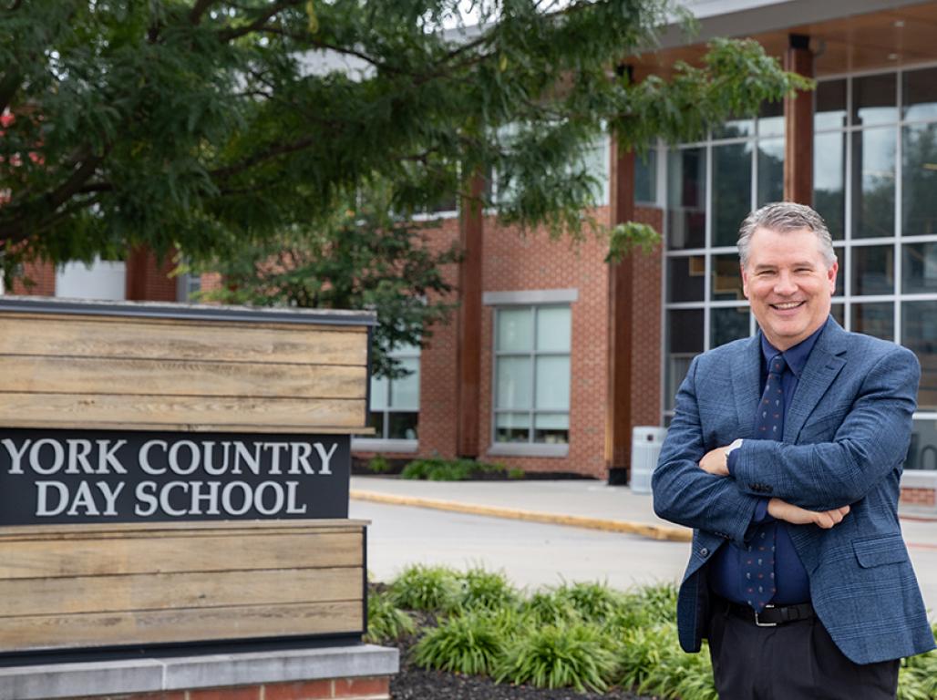 Doug Key standing in front of YCDS.