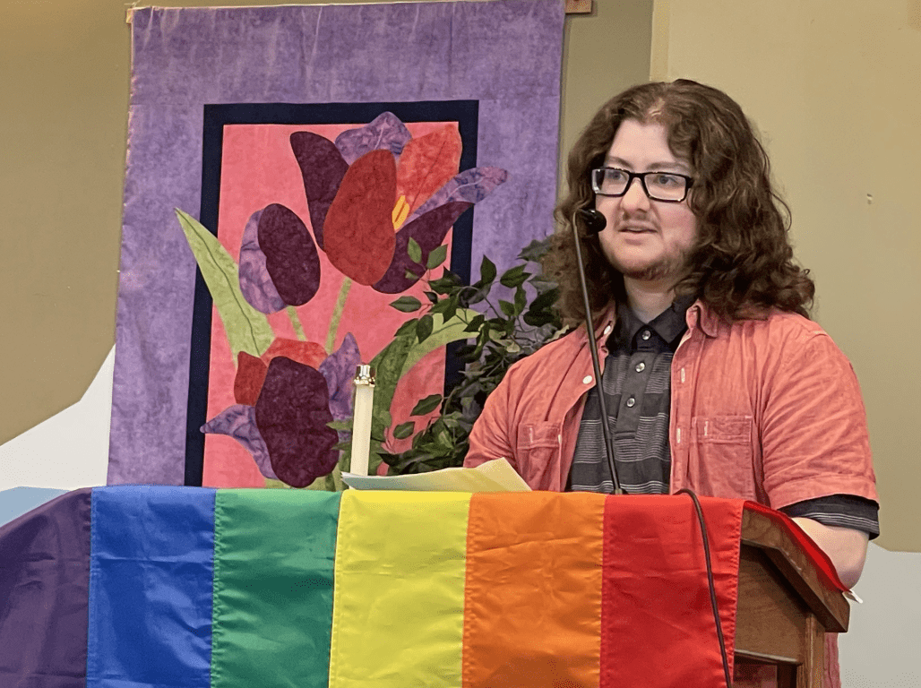 Kane Howard '25 at a literary reading event.