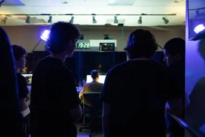 Students inside York College's recording studio for a night class