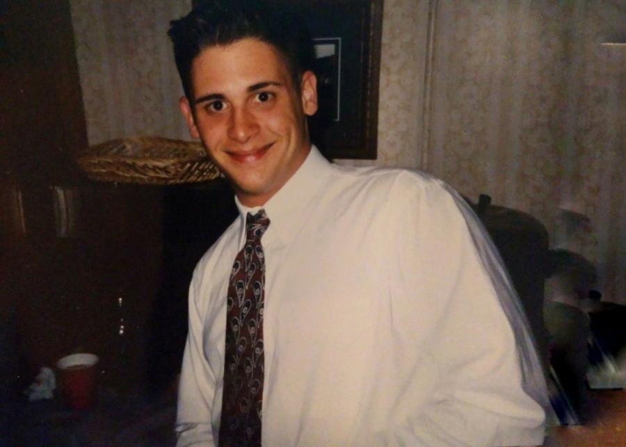 Frank Thomas Aquilino wearing a shirt and tie.