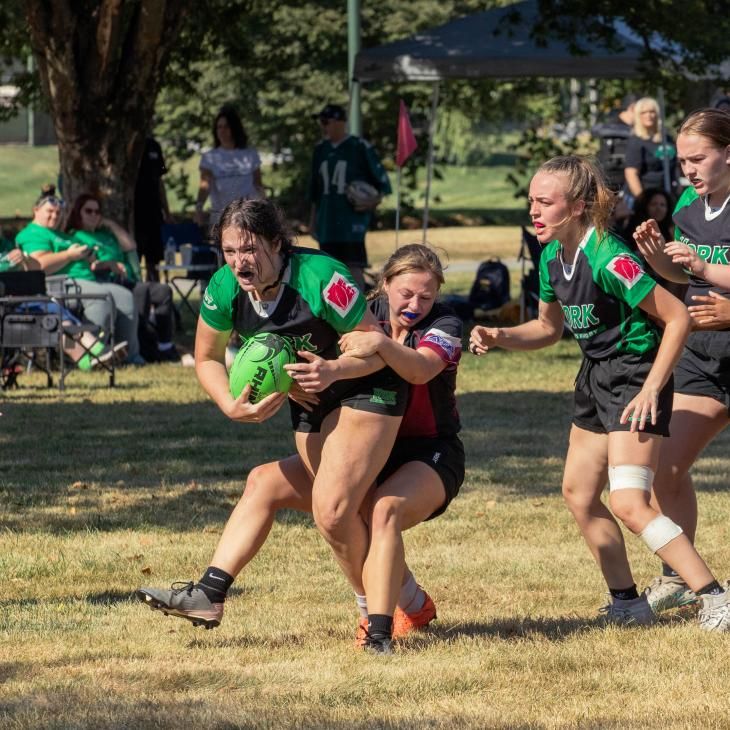 Women's Rugby game in action.
